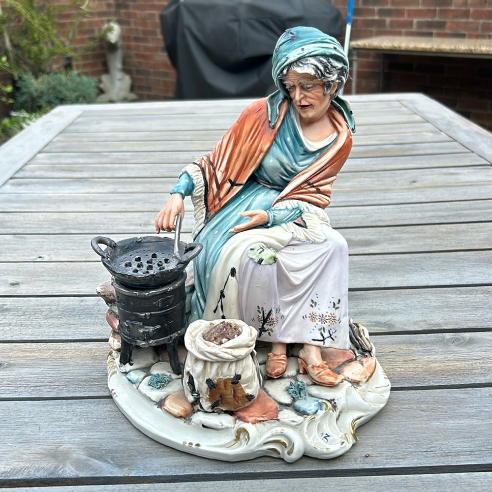 Porcelain Art of Woman Baking Chestnuts